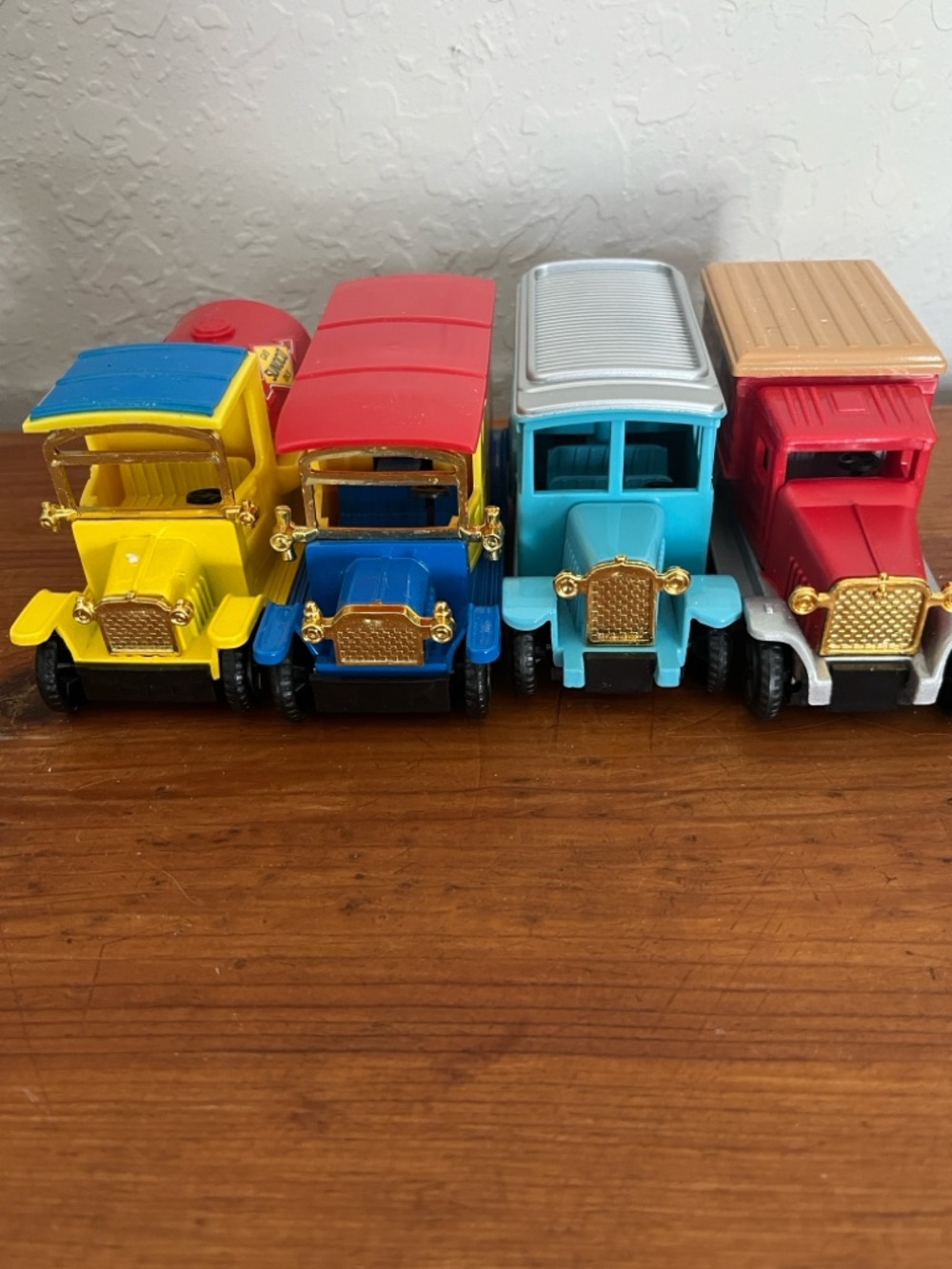 Vintage-Inspired Colorful Toy Truck Set - Yellow, Blue, Teal, Red